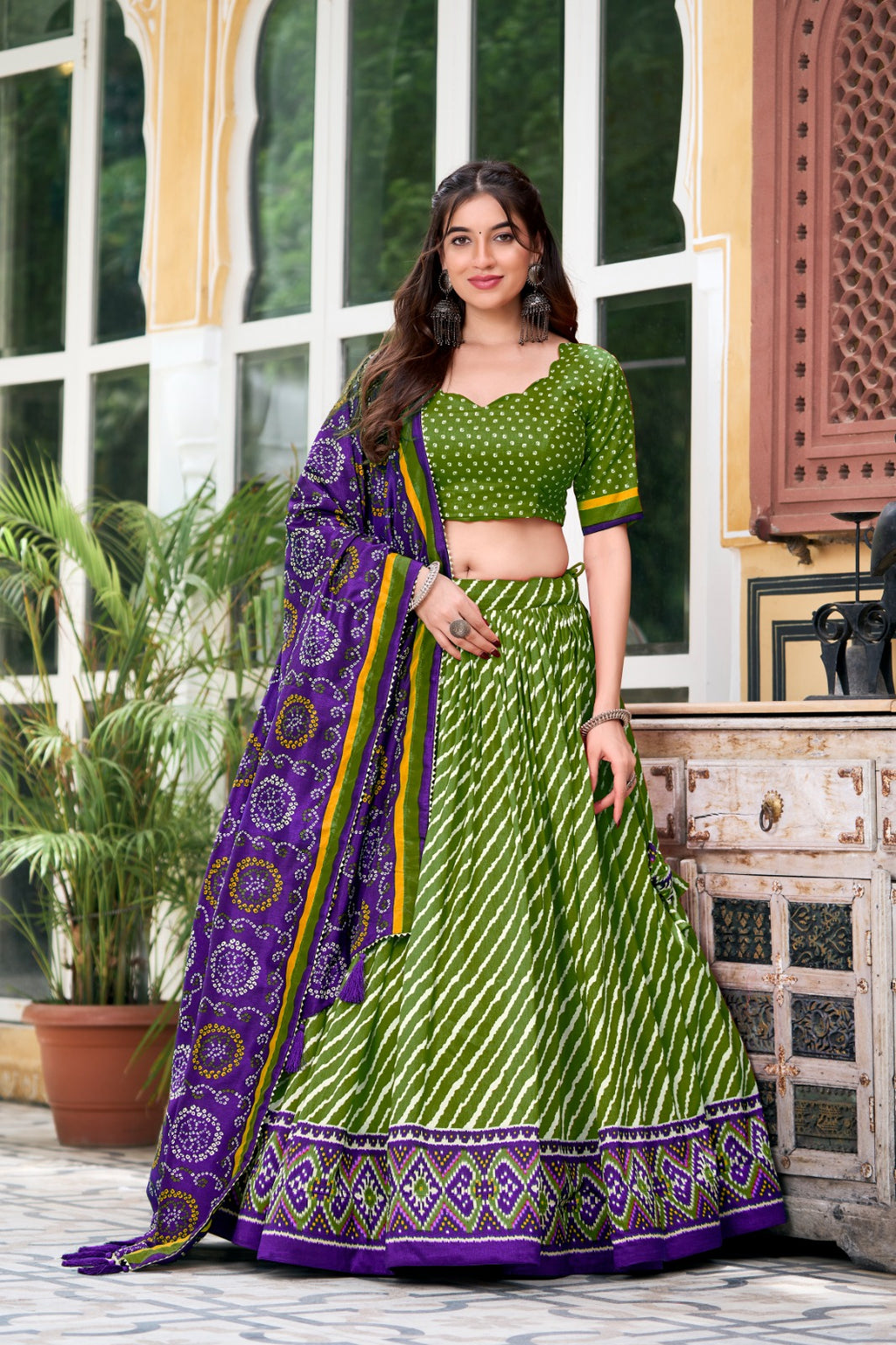 Lehenga Choli - Embrace Cultural Grandeur with Our Elegant Leheriya Print Tussar Silk Lehenga Choli, Featuring a Gorgeous Patola Print Border and an Exquisite Bandhani Print Dupatta Color - Parrot Green
