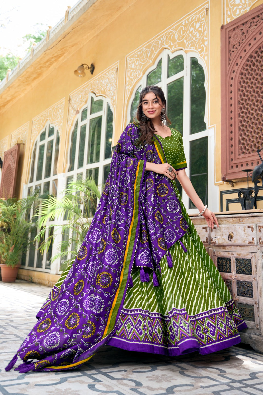 Lehenga Choli - Embrace Cultural Grandeur with Our Elegant Leheriya Print Tussar Silk Lehenga Choli, Featuring a Gorgeous Patola Print Border and an Exquisite Bandhani Print Dupatta Color - Parrot Green