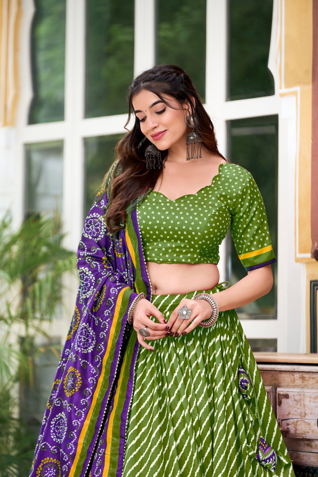 Lehenga Choli - Embrace Cultural Grandeur with Our Elegant Leheriya Print Tussar Silk Lehenga Choli, Featuring a Gorgeous Patola Print Border and an Exquisite Bandhani Print Dupatta Color - Parrot Green