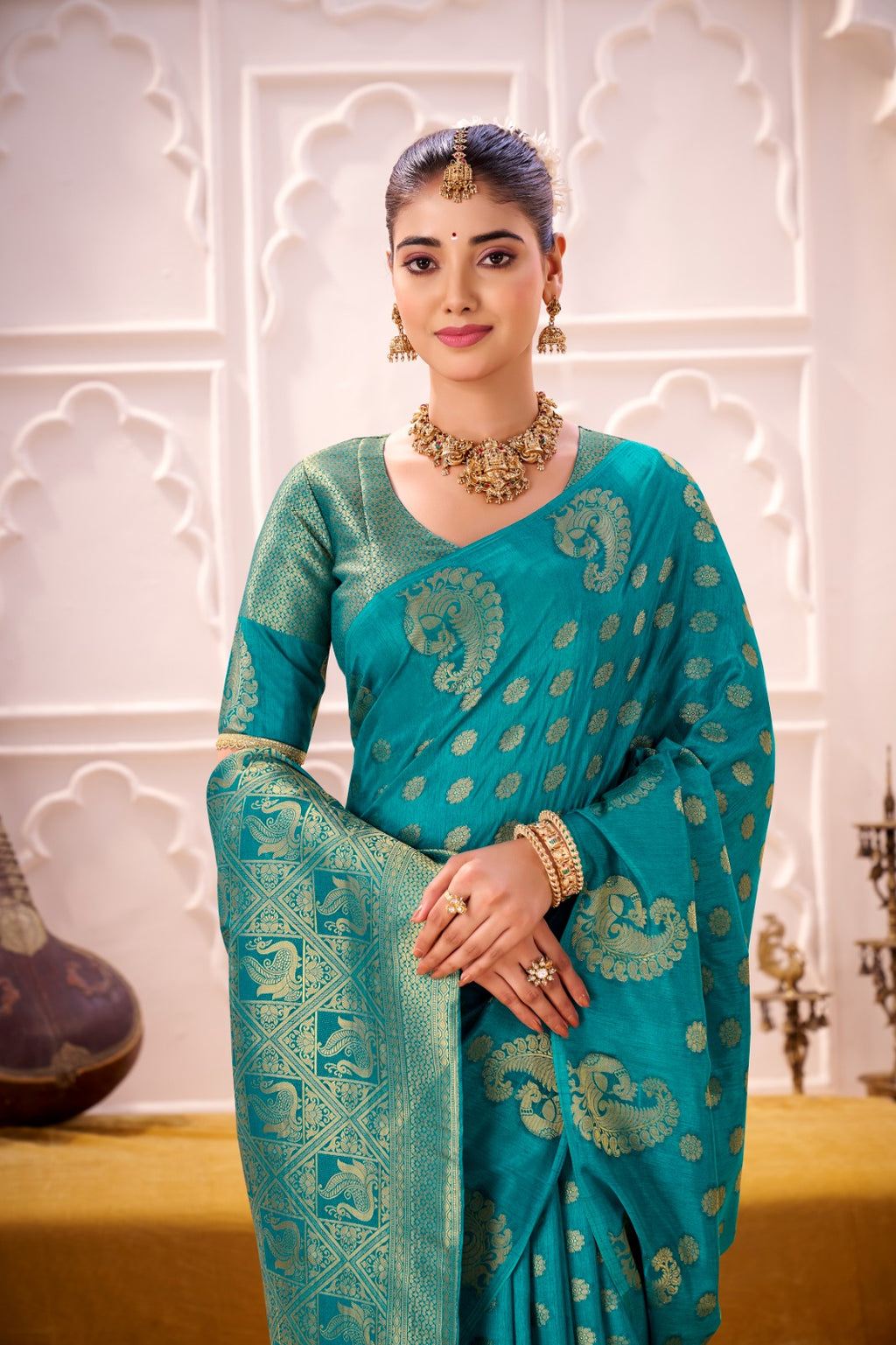 Draped in the Opulence of Roop Silk woven with zari work (Firozi)